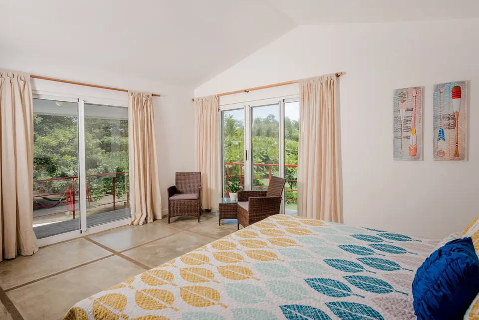 Upstairs bedroom and balcony